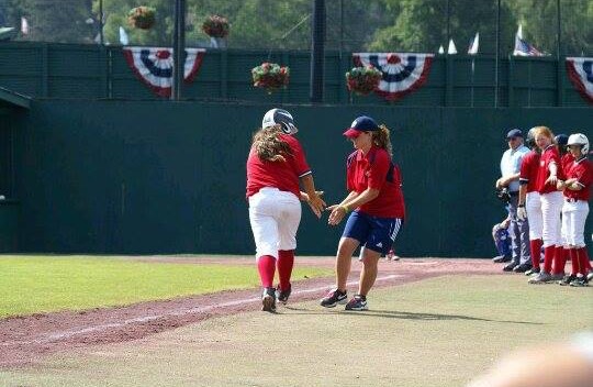 Kate Harris, named the 2014 Manager of the Year by the National Women's Baseball Hall of Fame in Chevy Chase, MD. She is the youngest manager to receive this award.