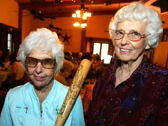 Two players from the All American Girls Professional Baseball League, Maybelle Blair (left), who pitched for the Peoria Red Wings and Shirley Burkovich, who played for the Rockford Peaches.