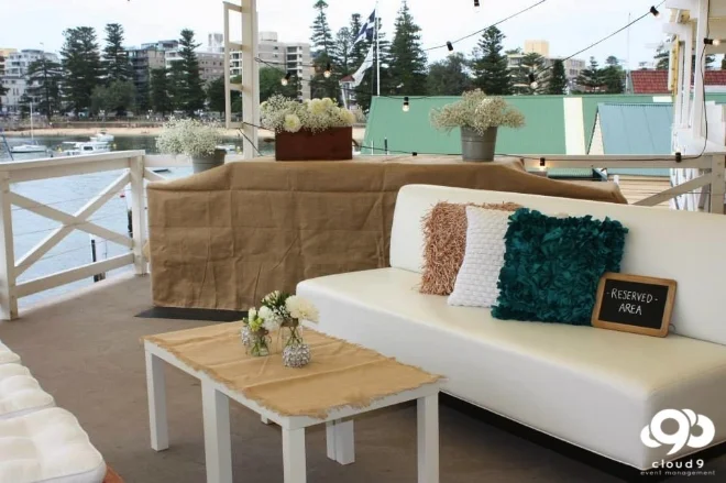 Manly Yacht Club . cocktail wedding reception w/ white sofa, hessian + baby's breath