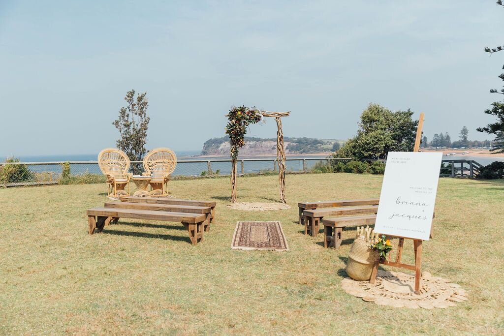 Driftwood_Arch_Peacock_Chairs_Long_Reef_Wedding_Ceremony.jpeg