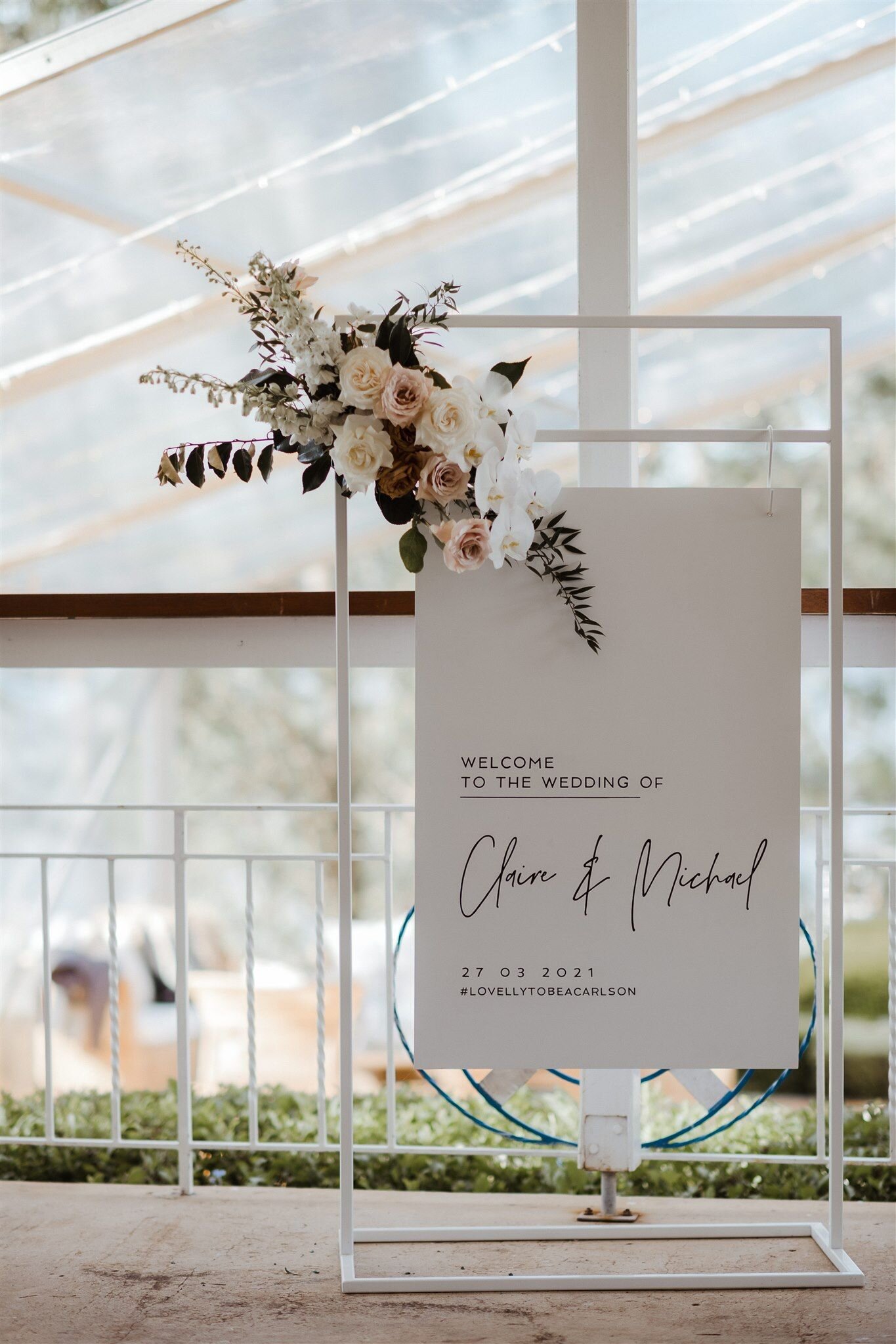 Welcome_sign_Custom_white_frame_hanging_Claire_Mike.jpeg