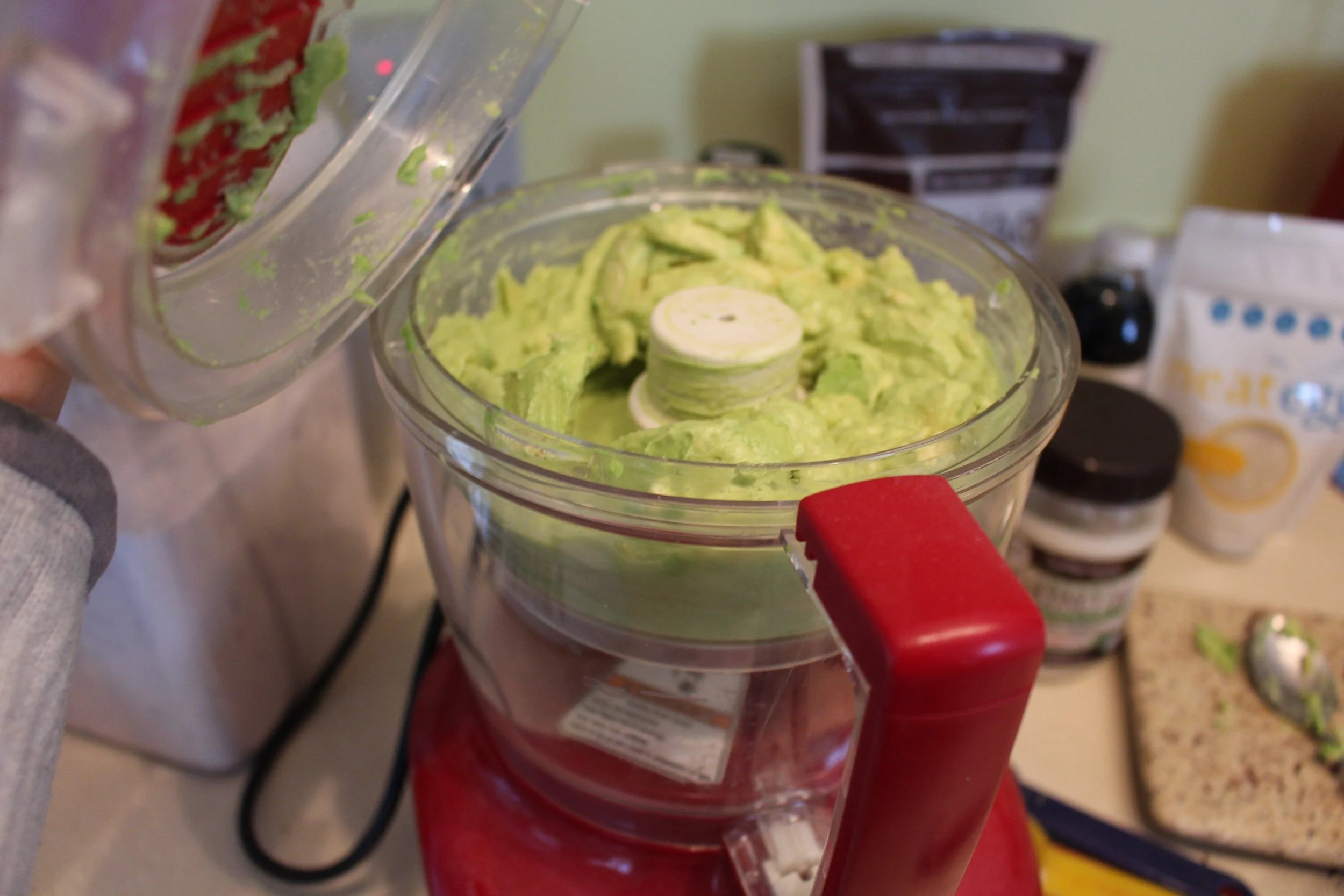 Blend avocados until creamy