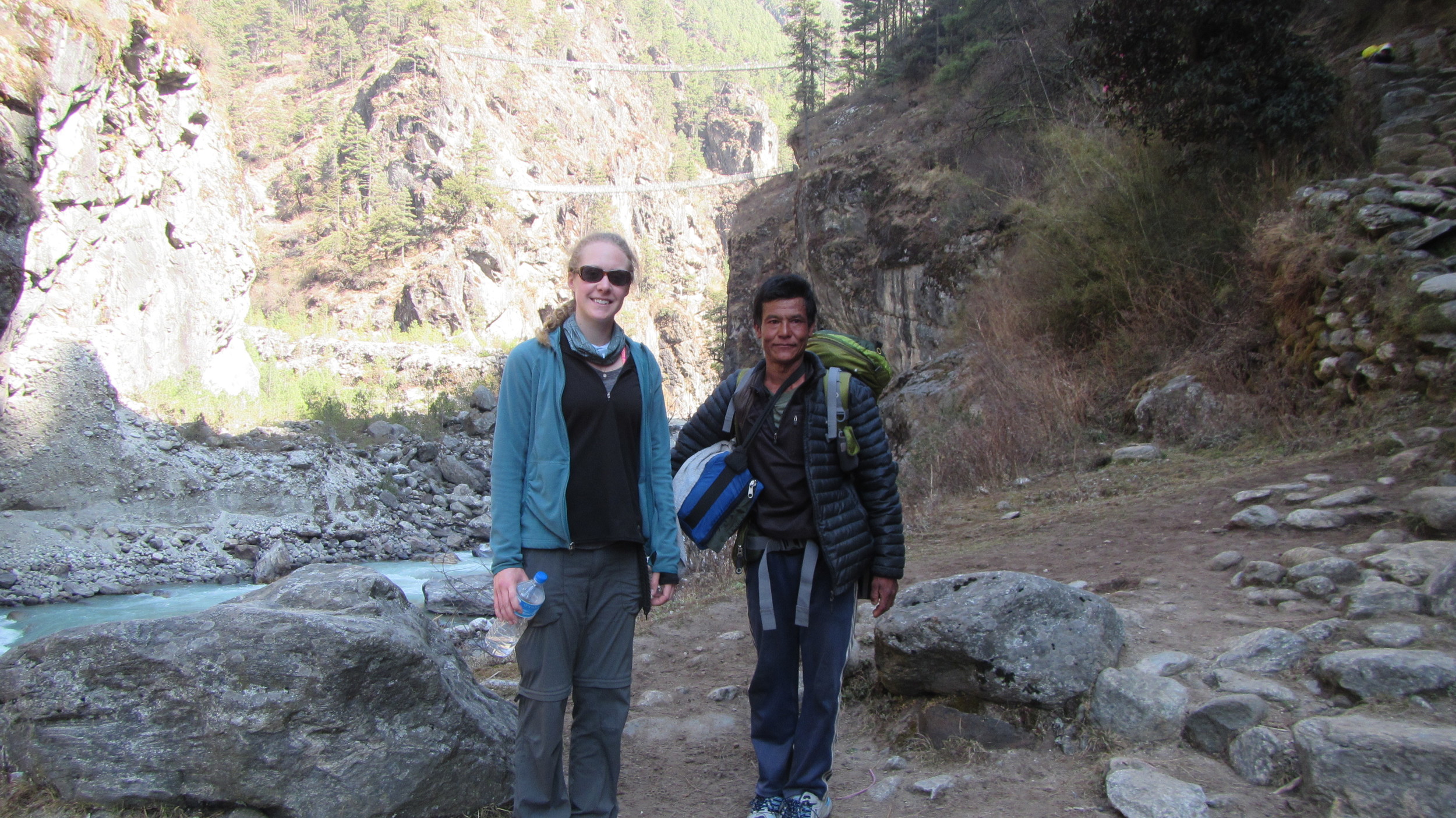 Sierra and Porter in front of bridge.JPG