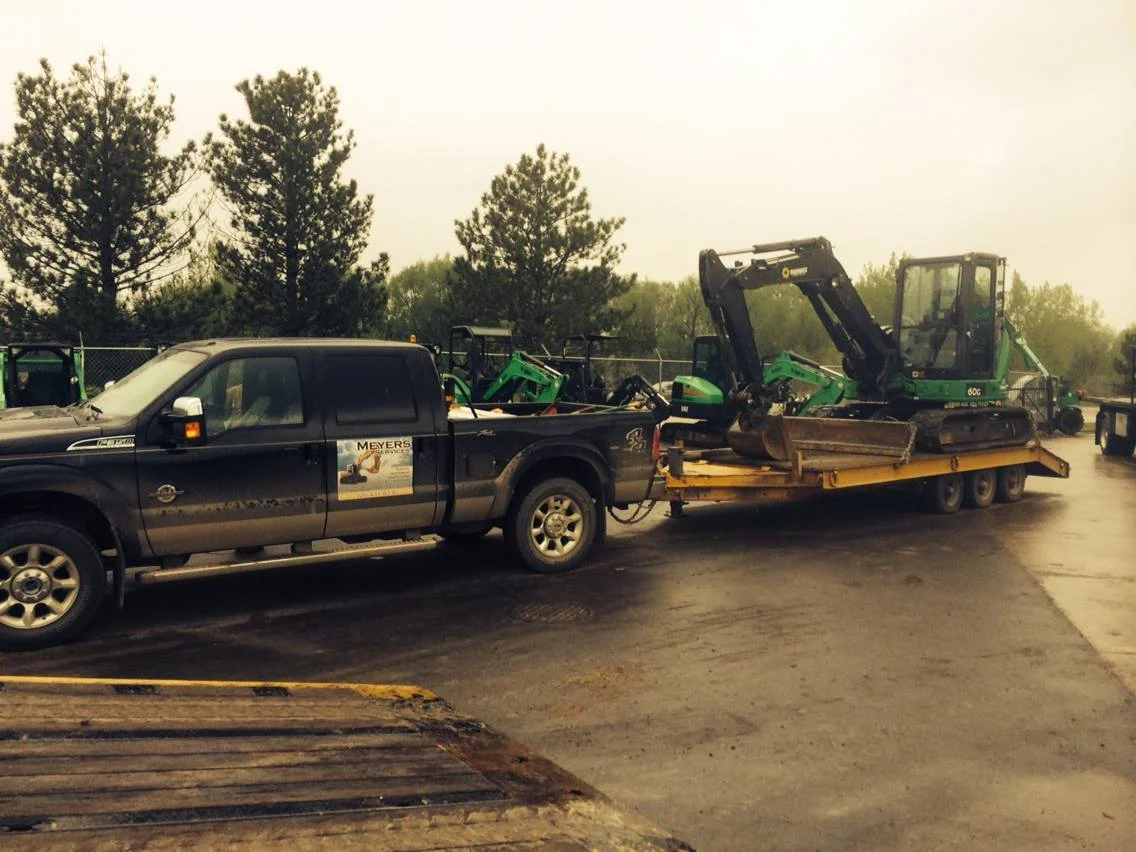 truck w mini excavator.jpg