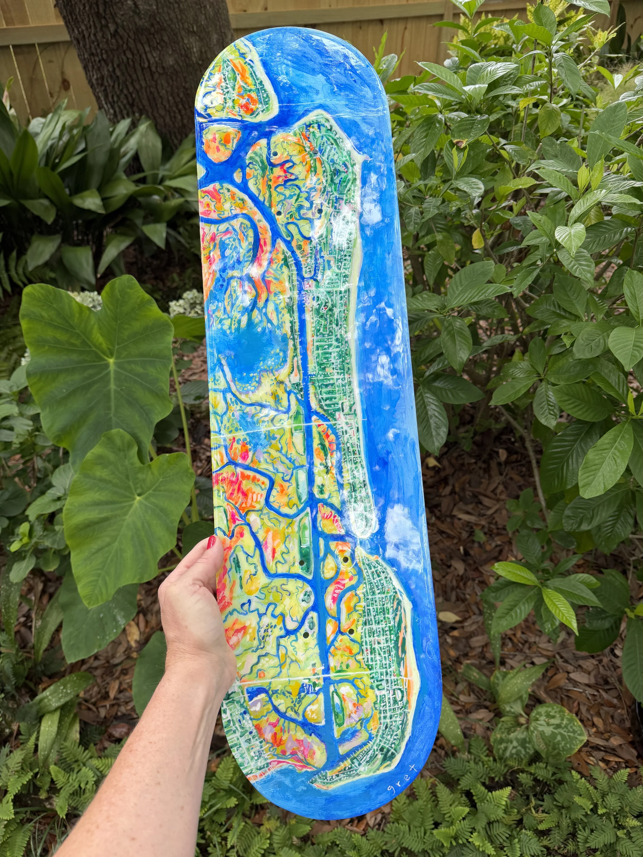  skatedeck painted with maps of Sullivan’s Island and Isle of Palms, SC.  phosphorescent paint makes this deck glow in the dark!  by artist Gret Mackintosh in Charleston South Carolina 