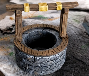 Village Well , printed and painted (well) by Devon Jones