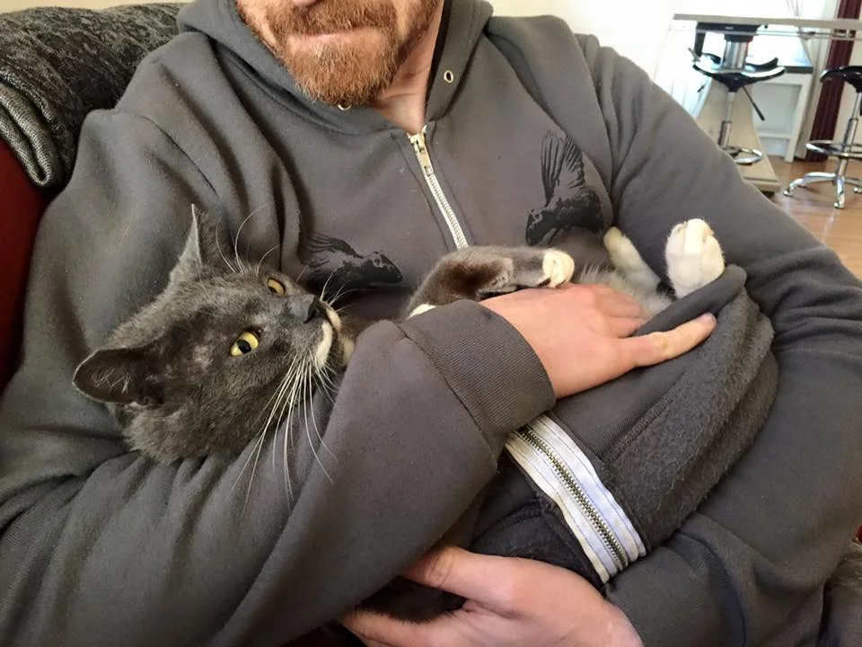 Ben's favorite way to be held - like a baby!