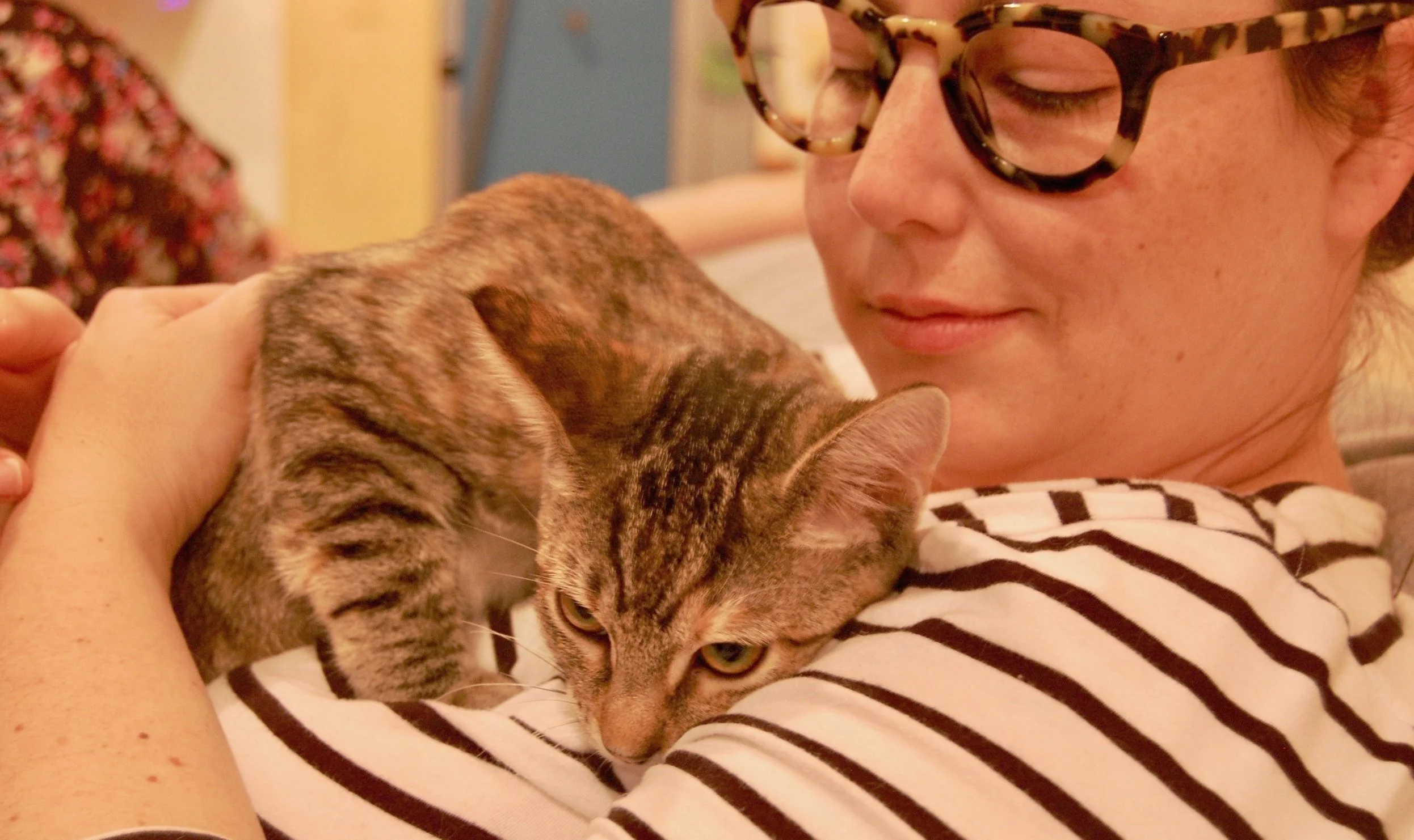 One final snuggle session with Oak before sending her on to her new home. Photo by Cathy Niland.