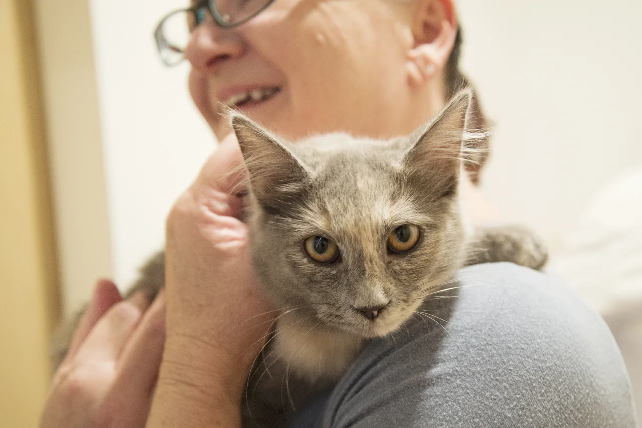 Leaf and her adopter at pickup. Photo by Marie Luise Klotz.