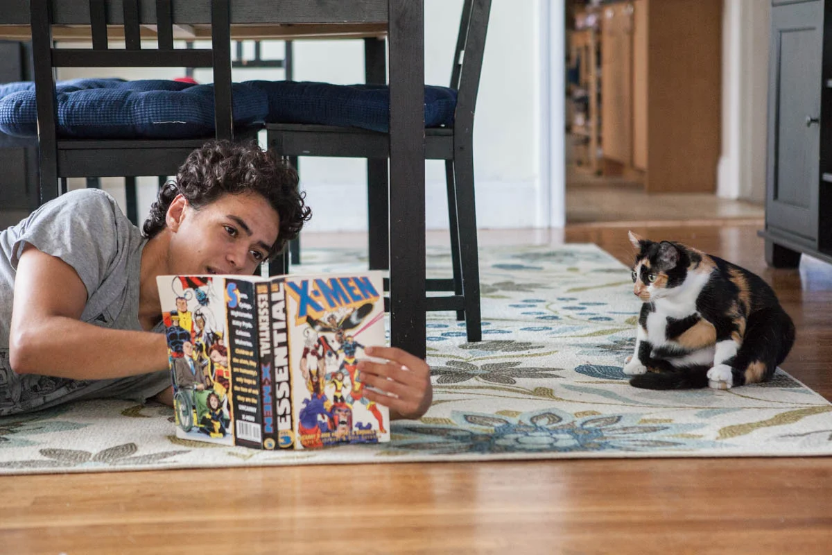 One of Sabine’s children reading books aloud to Jules to help earn her trust.