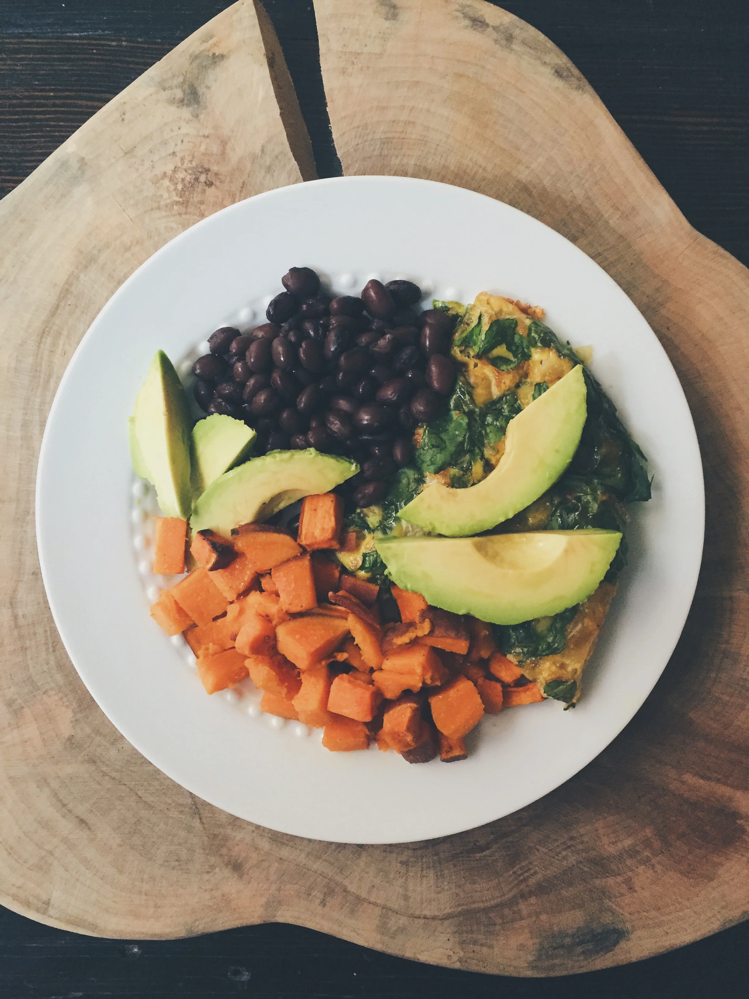 Broiled Vegetarian Frittata with a side of homemade sweet potatoes and black beans