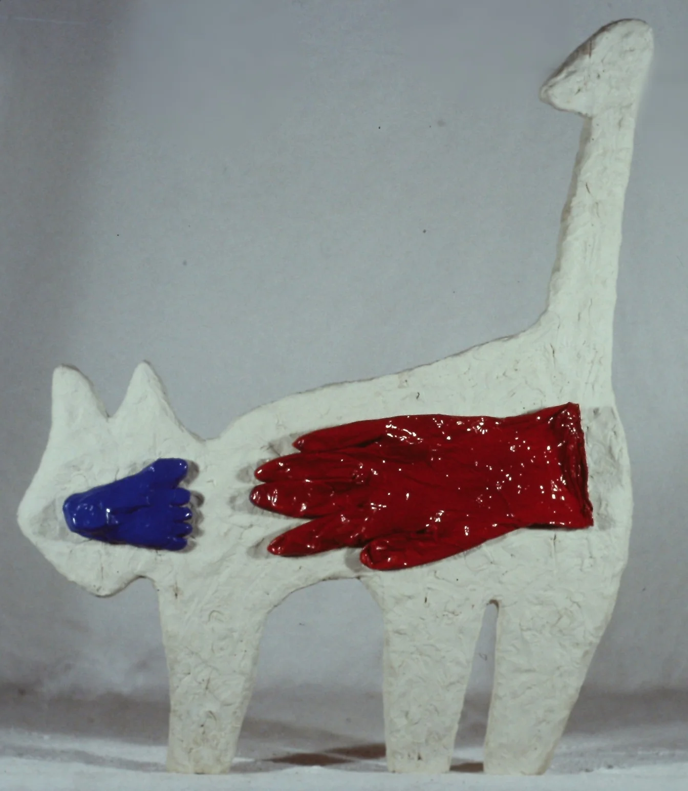 blue foot / red hand / white body