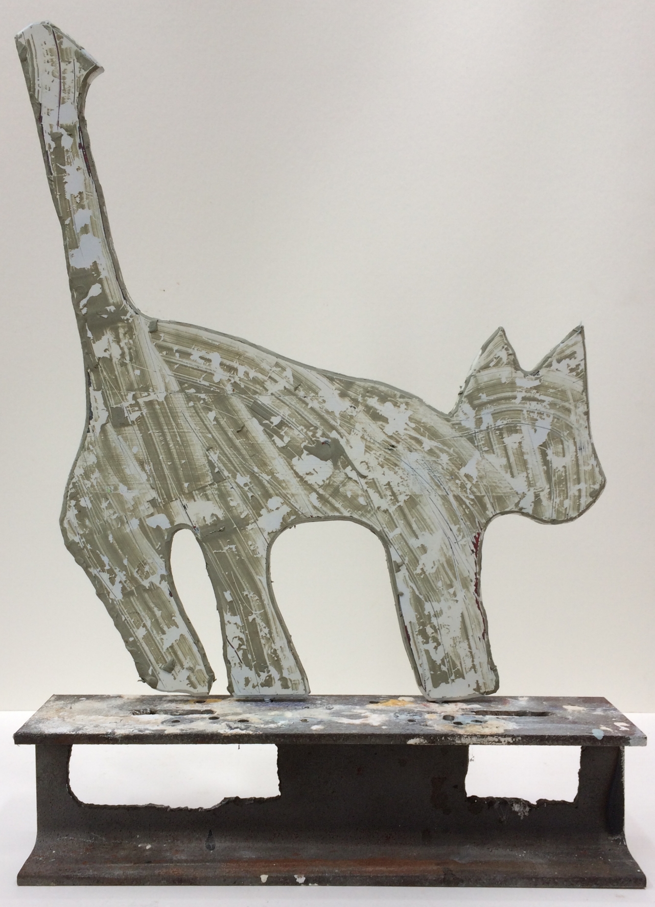 scraped green off white