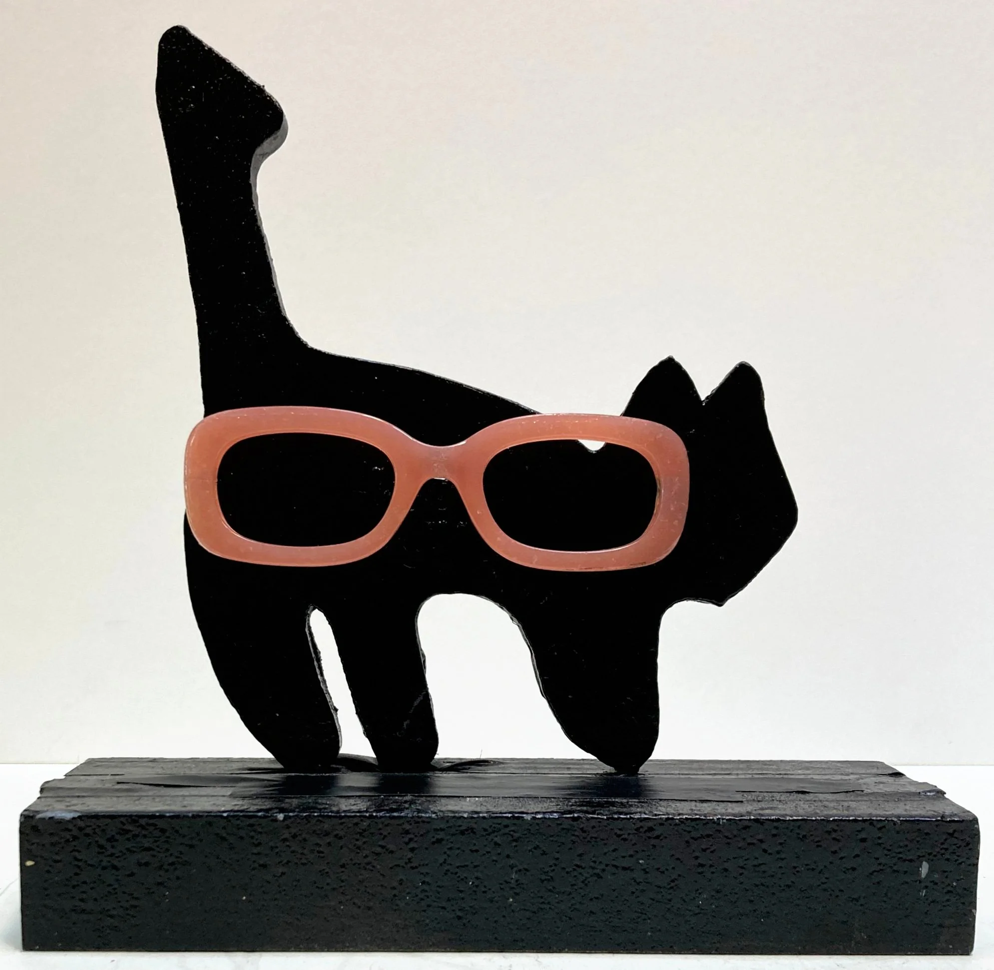 Carol wears coral at the K + A