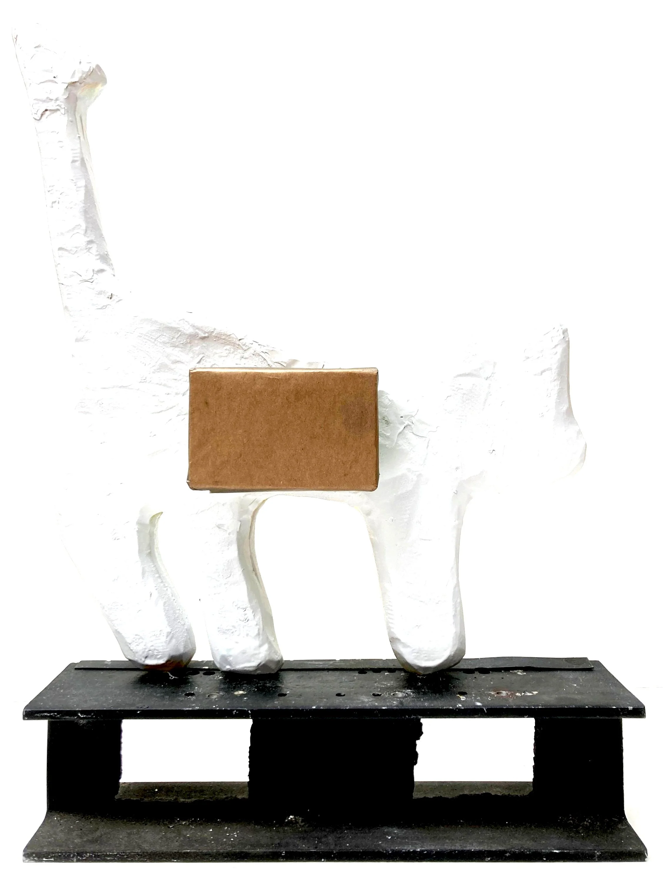 brown paper wrapped wood block