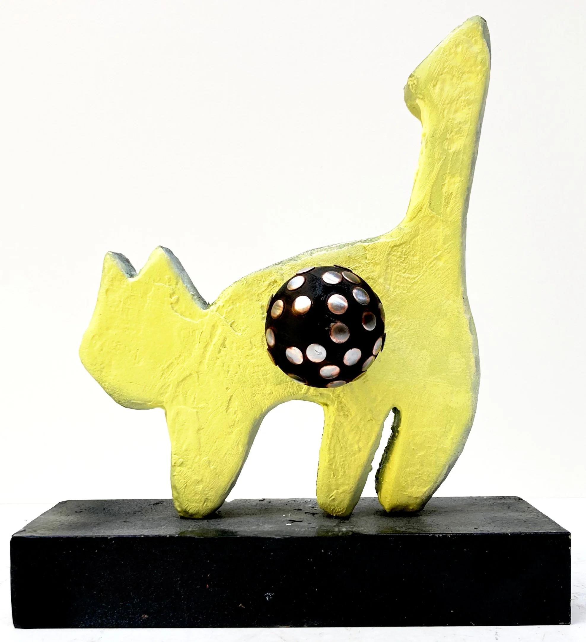 wood sphere with copper rivets