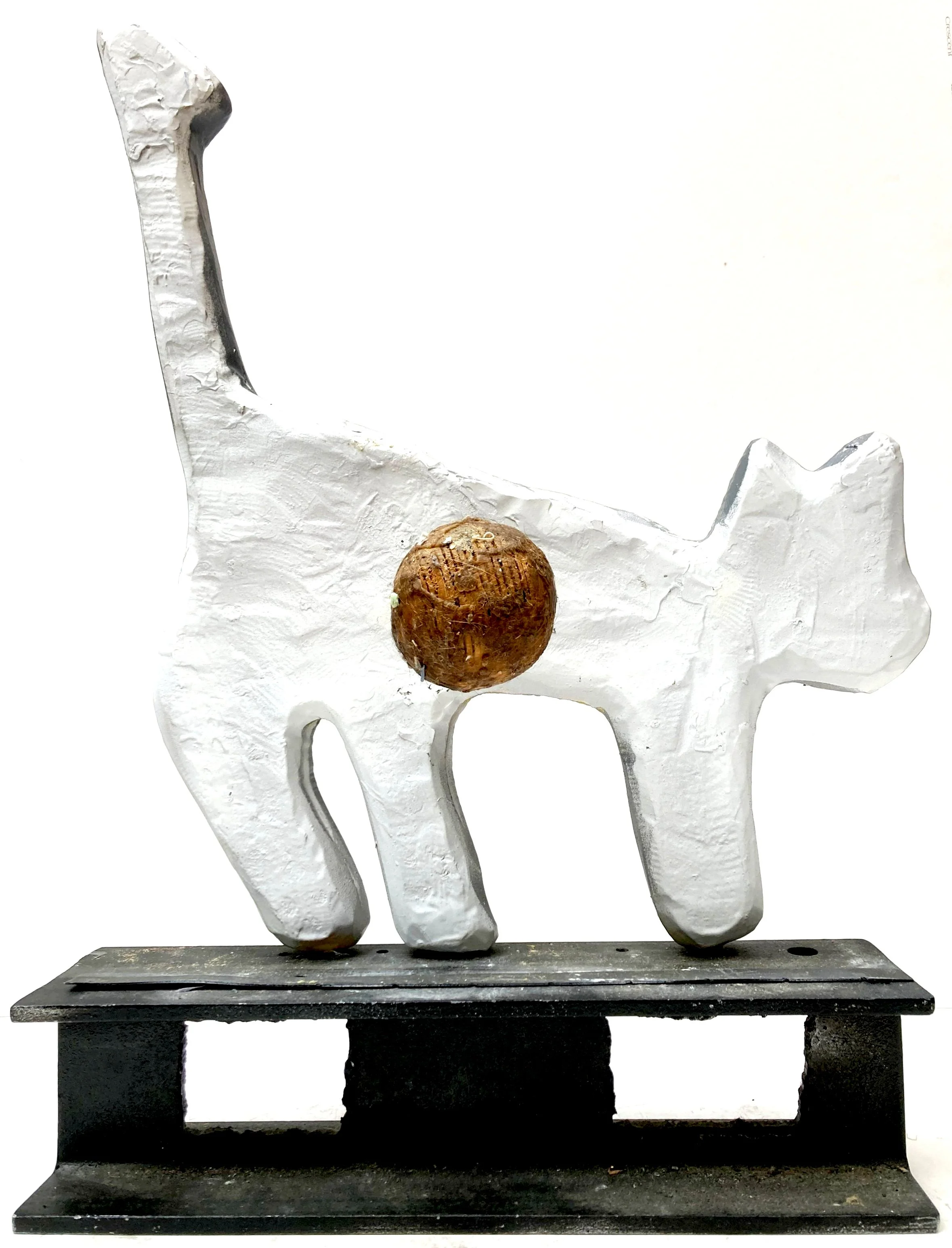 waxed wood sphere rolled on uncleaned carpet