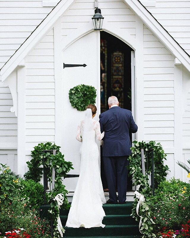 Lush green wreaths and garlands highlight the simplistic beauty of this sweet southern chapel🌿  #emilyellisonstudio