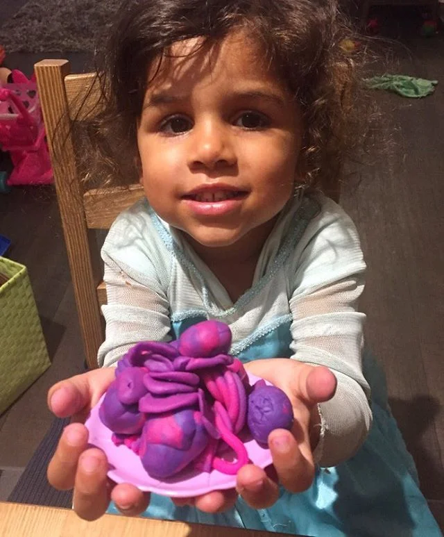 Happy International Day of the Girl Child ! Here is a photo of my granddaughter from a few days back. I was watching her develop her playdough sculpting skills while babysitting her. She is now 3 1/2 years old. She is intelligent, intuitive and a joy