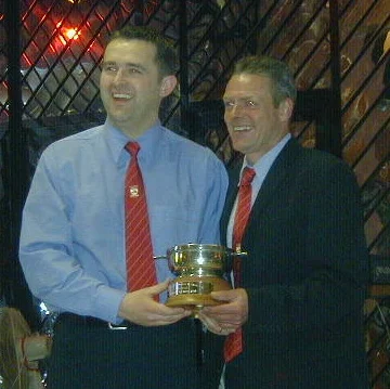 Russell Brebner presents Bruce with a quaich from Hill Of Beath Hawthorn.