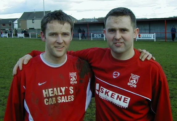 Bruce with brother Paul after the match.