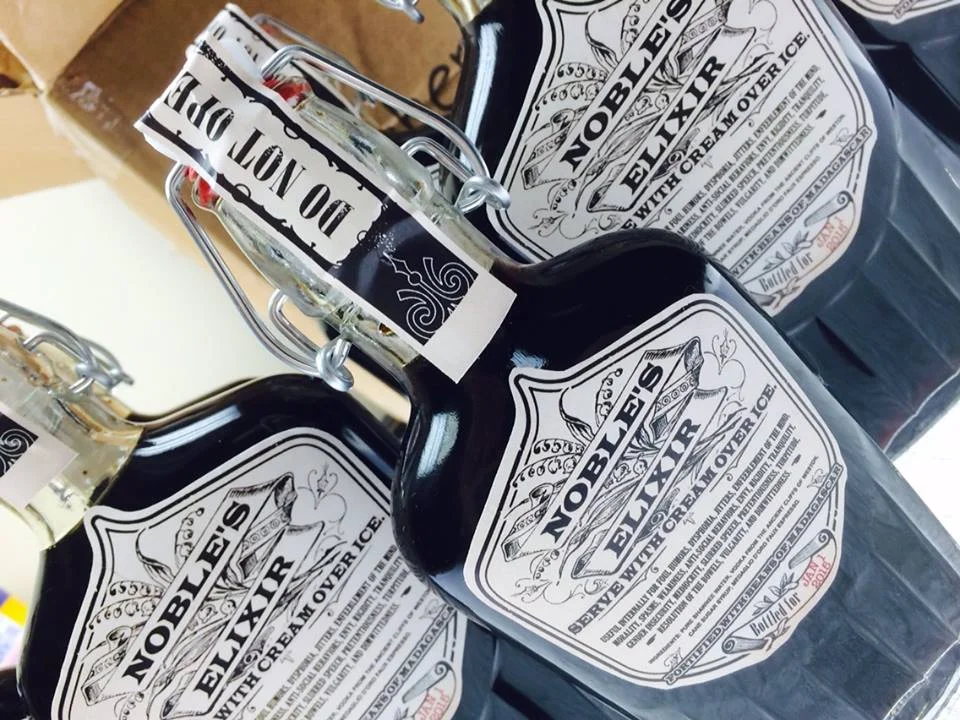 Nobel's Elixir Vintage Bottle Design