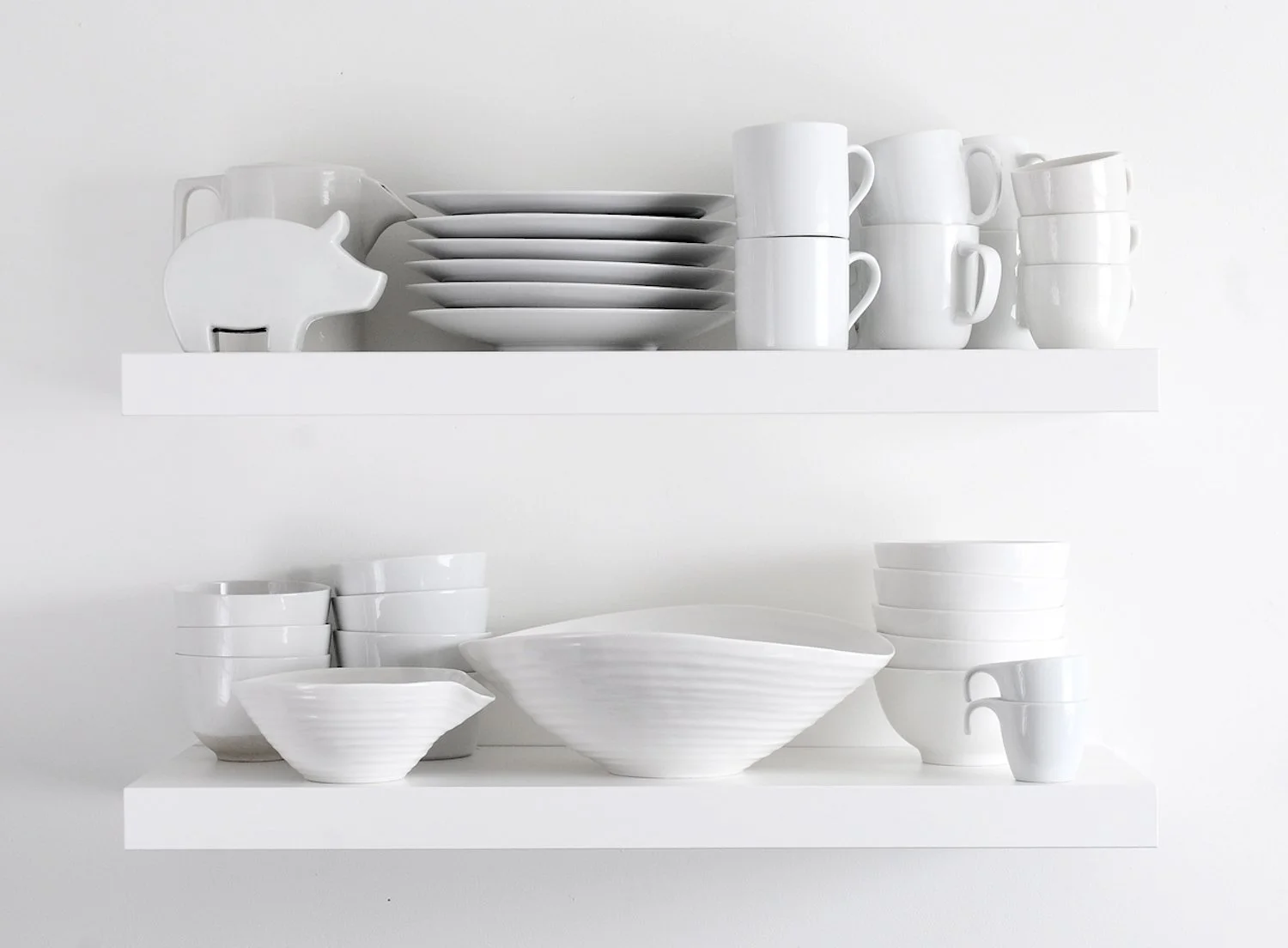 white crockery on wall shelf.jpeg