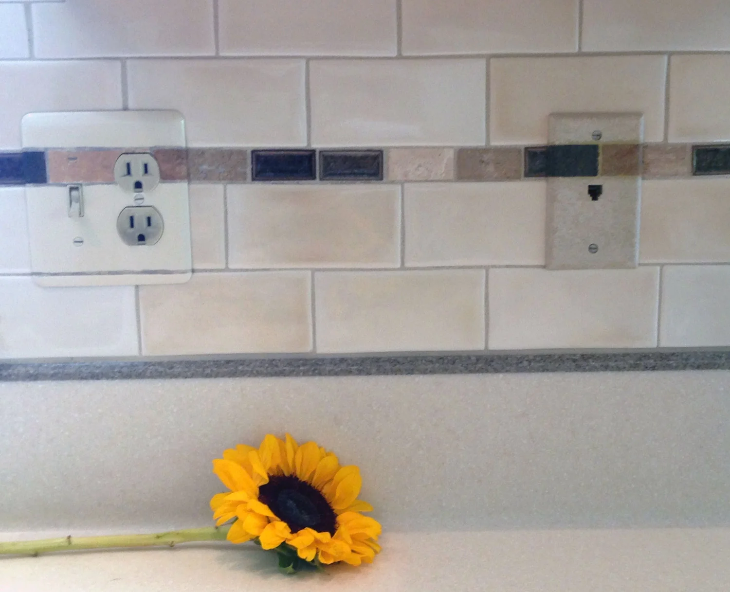 custom-backsplash-painted-outlet-covers.jpg