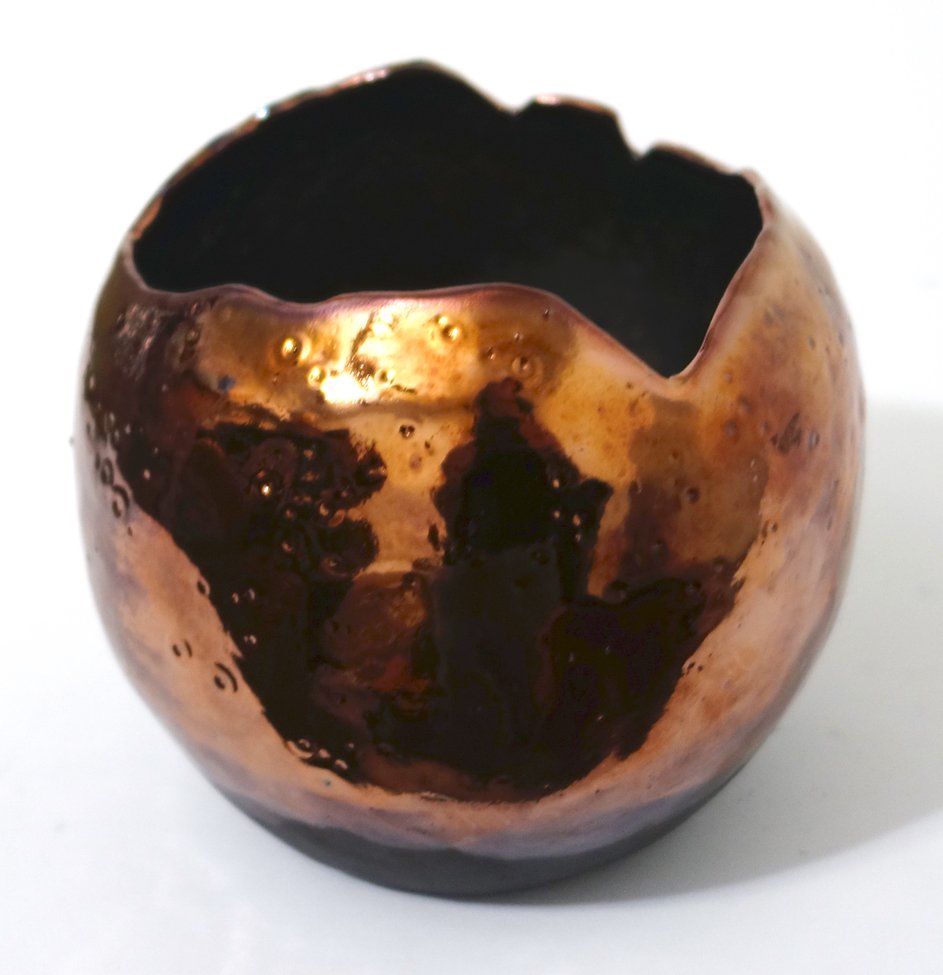 Handmade round black  blistered stoneware ceramic watering pot with black and golden glossy glaze