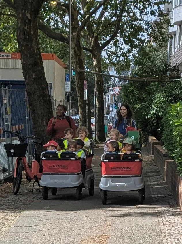 kids in wagons.jpg