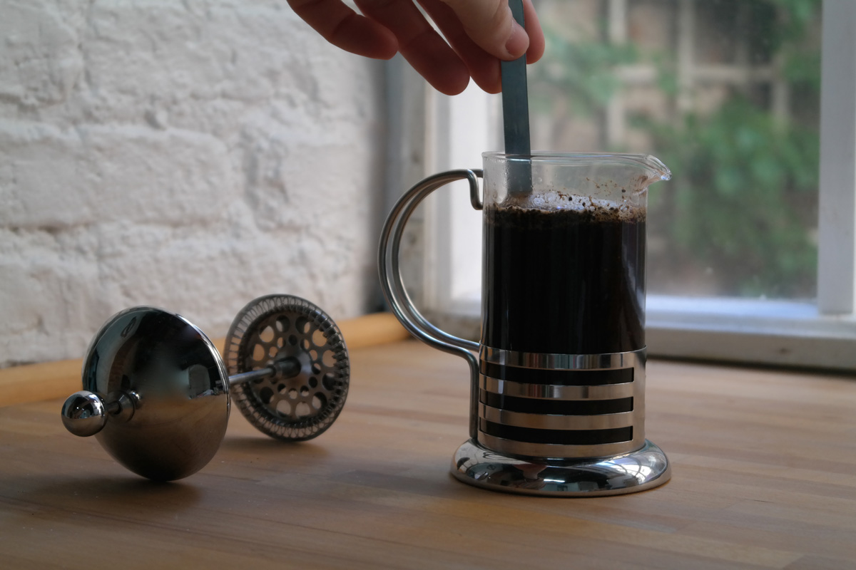 Give the pot a little stir. Let the coffee brew for 3 minutes.