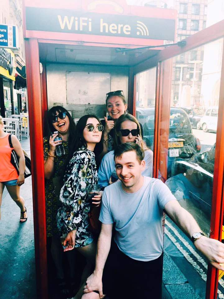 Challenge: Photo of all team members in a phone box