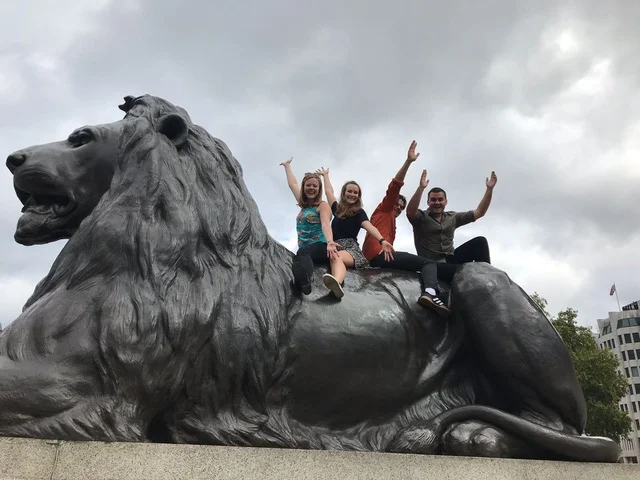 Team having fun in trafalgar square