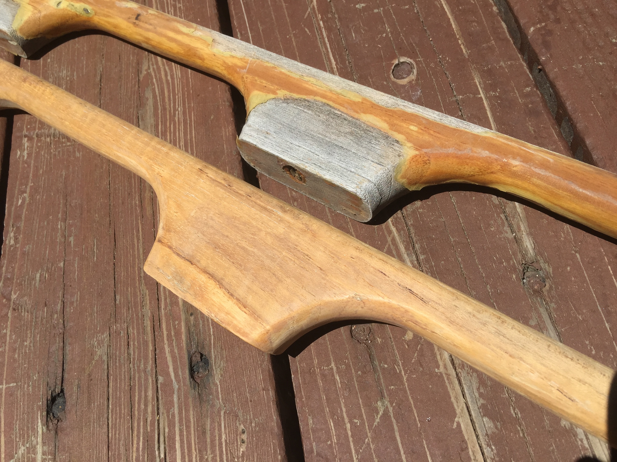 A close up shot of one of the two hand rails after being restored to their former glory (before the varnish etc.)