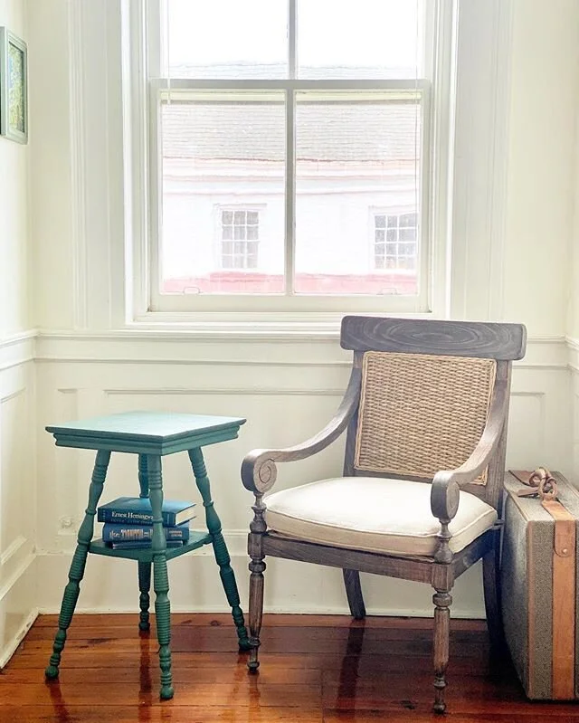 We don’t have a lot of furniture. We have five chairs, a rug, this table, a mattress, and a kitchen nook that arrived yesterday. We’re starting from scratch, building a life on land again after two years of living on the sea.
Garrett and