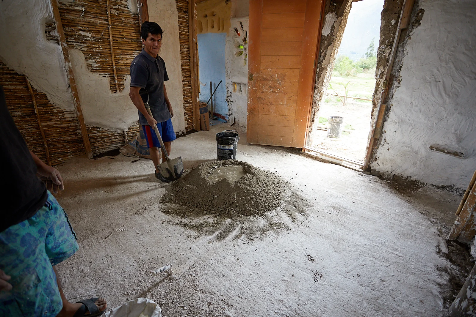 Finishing the floor in the middle room. The second of 3 rooms total, excluding bathroom which is accessed from outside. 