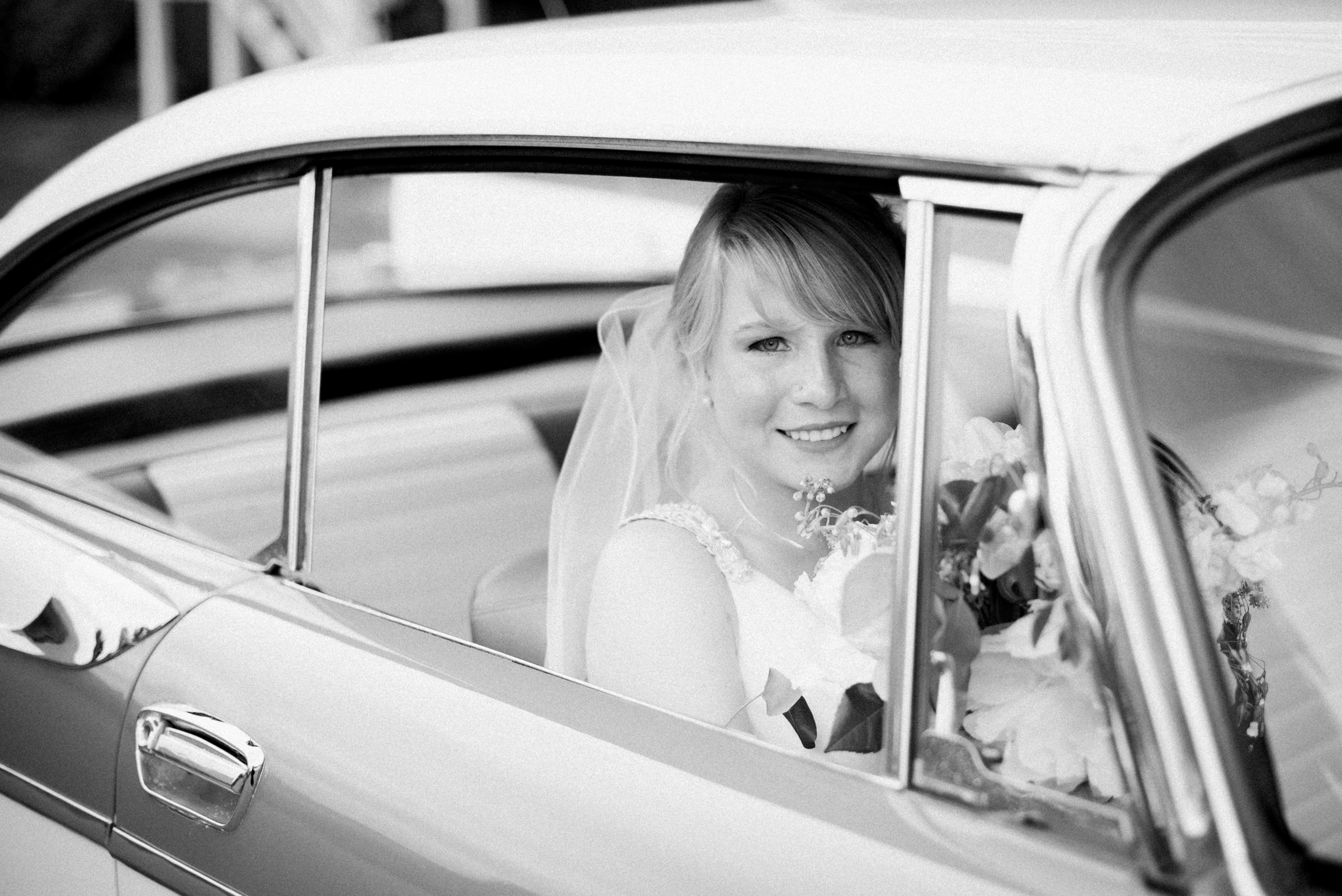 Vintage car bridal portrait