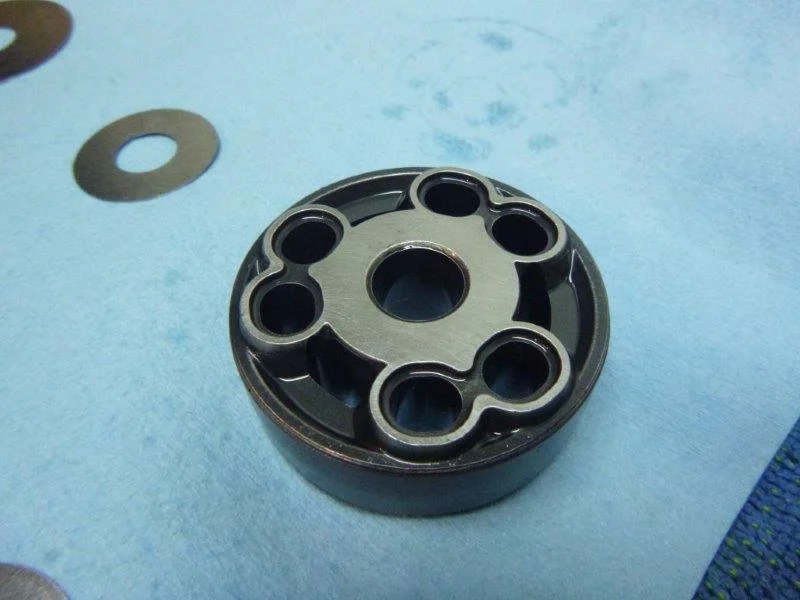 The new shock piston uses three sets of paired compression ports.