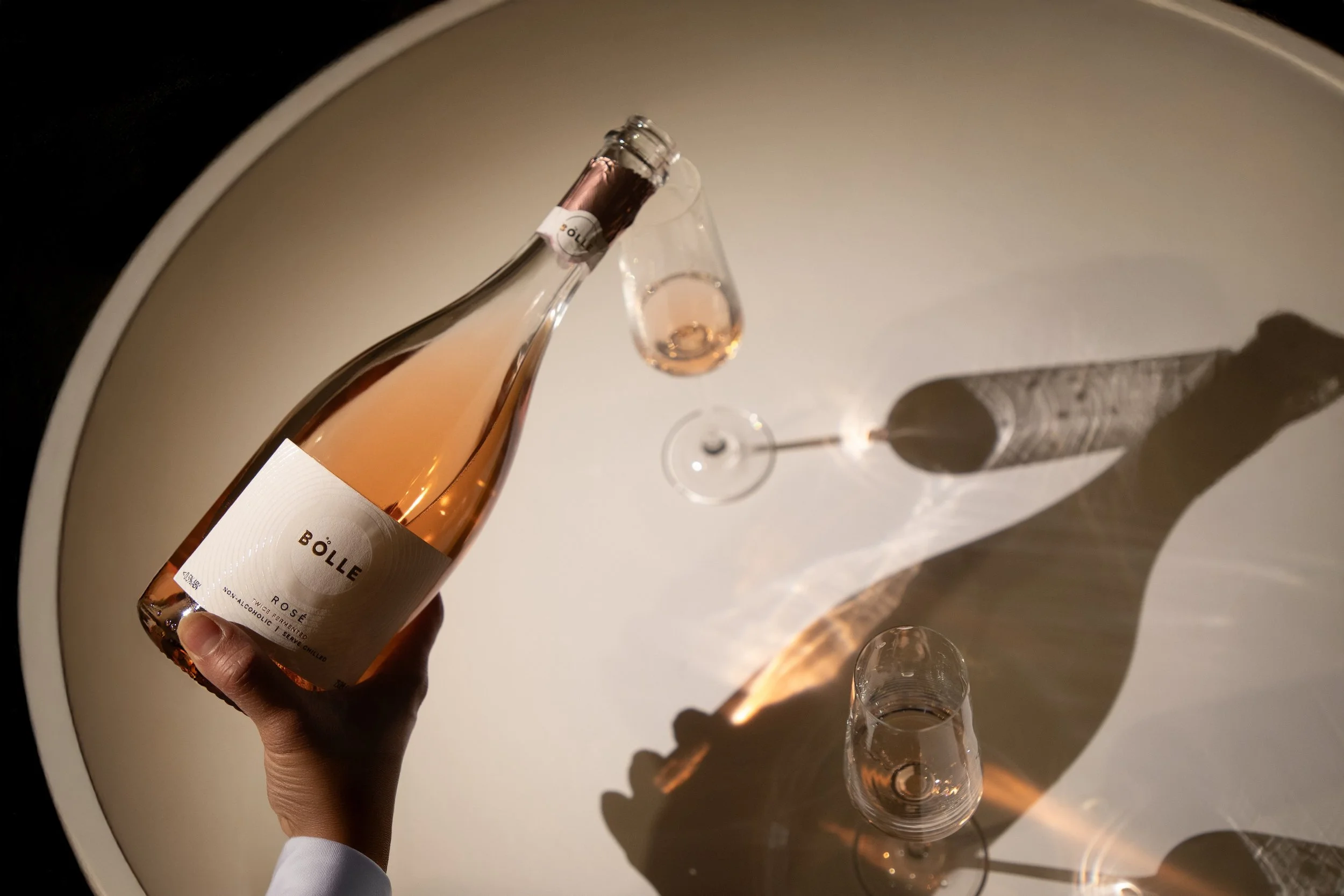BOLLE_Sparkling_Rose_750ml_Pour_sparkling-rose-bottle-being-poured-into-_0001.jpg