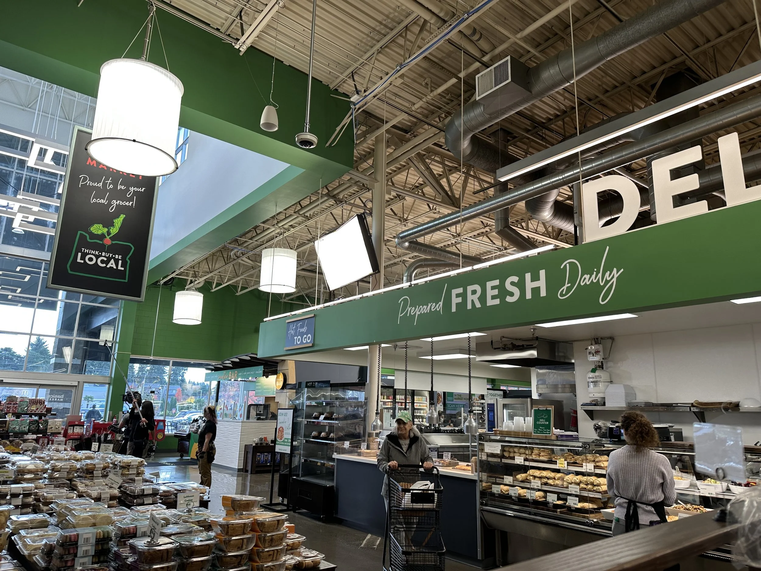 Filming in grocery store, behind the scenes, Portland gaffer
