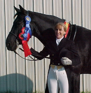 Jane and Roberto USDF All Breeds Reserve Champion Intermediare I Waterloo Reserve Grand Champion Prix St. George