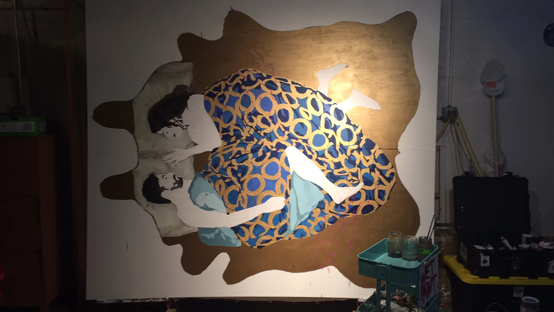 I got to this painting after 5 months of letting it sit in the studio while working on the mural at navy pier . Here's what it looked like after adding a gold background and some golden rings to the blanket. The figures are still mostly untouched.