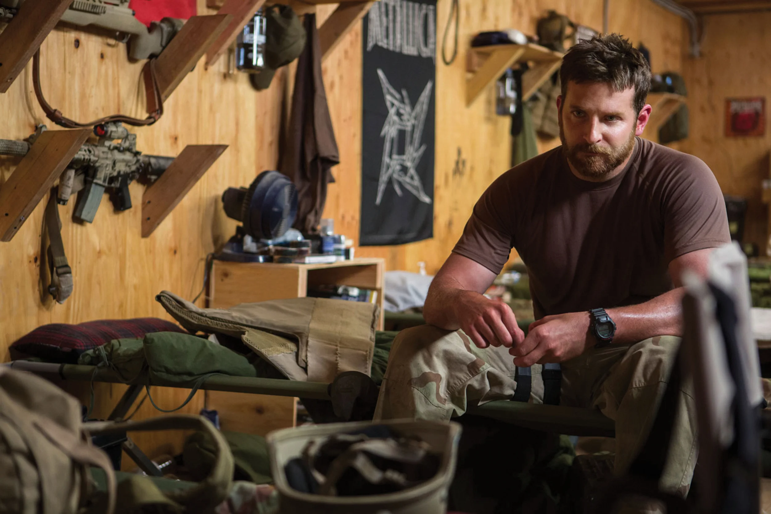 Chris Kyle (Bradley Cooper), in country, during one of four tours of duty in Iraq.