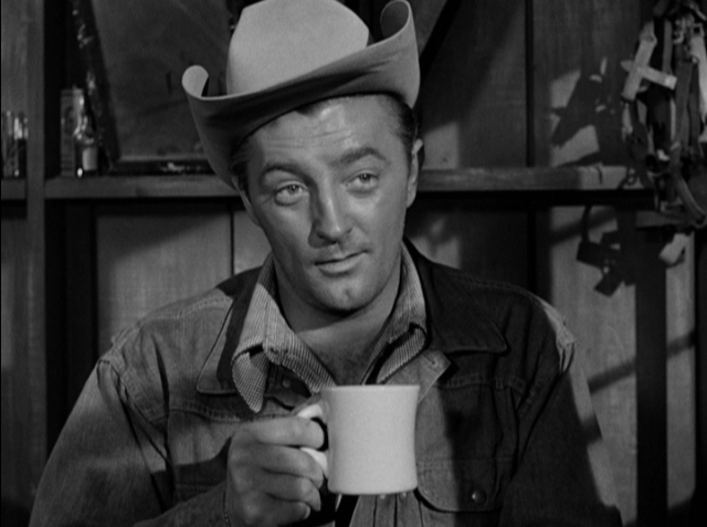 Robert Mitchum as former rodeo champ Jeff McCloud