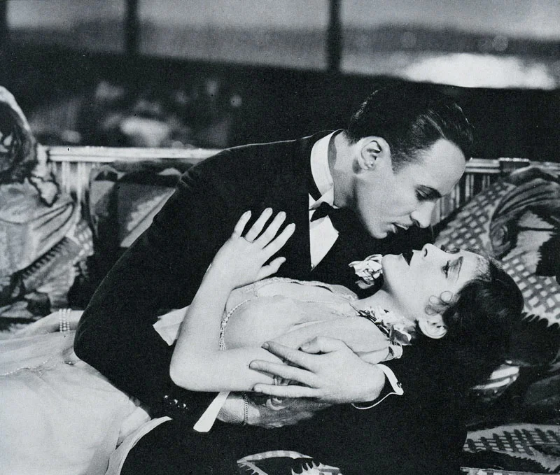 Michael Towne (Rod la Roque) and Joan Winslow (Billie Dove) in The Man and the Moment