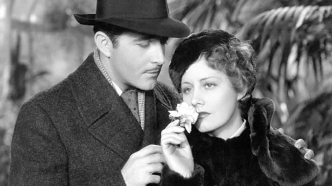 John Boles as Newland Archer and Irene Dunne as Ellen Olenska