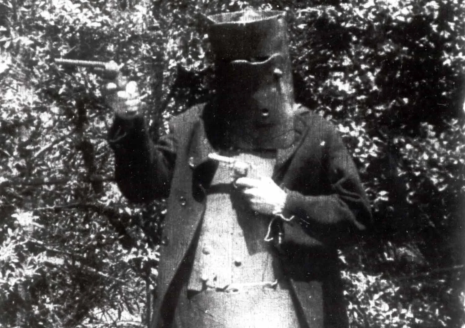 A masked train robber from The Story of the Kelly Gang (1906), Australia's first known feature-length film