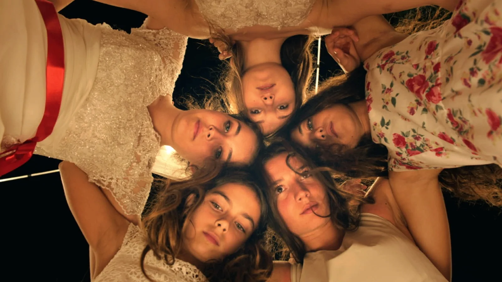 Clockwise starting with actress in red sash: Tugba Sunguroglu, Ilayda Akdogan, Doga Zeynep Doguslu, Elit Iscan, and Gunes Sensoy.