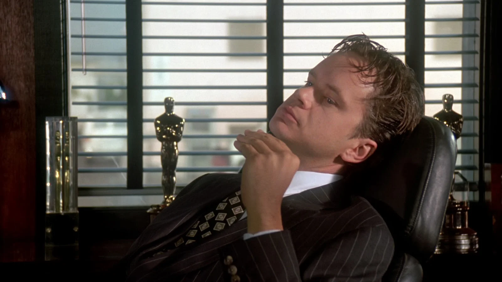Griffin Mill at work in his Hollywood office.