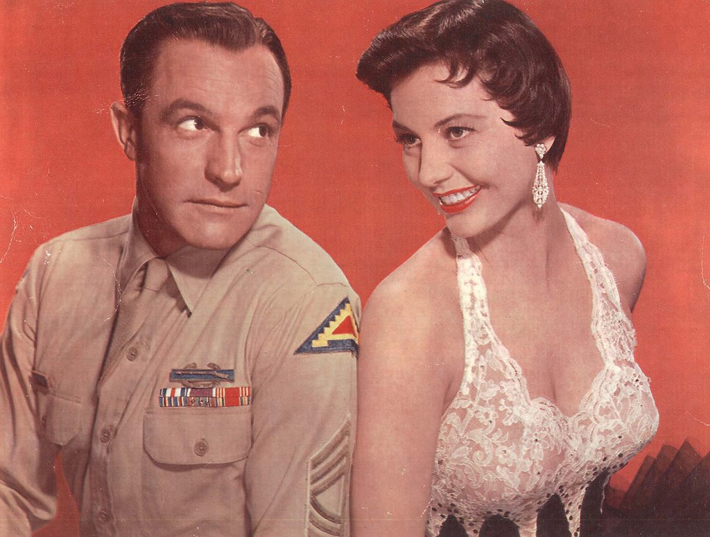 Gene Kelly and Cyd Charisse .